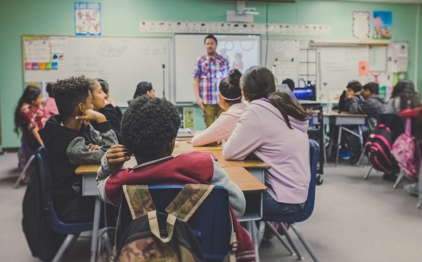 A teacher in front of a class